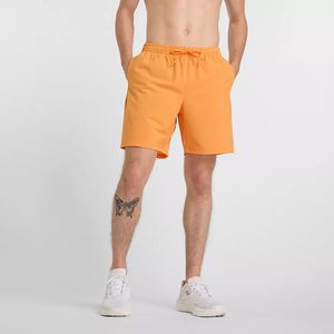 Short New Balance Hombre Sport Essentials Short 7 Naranja