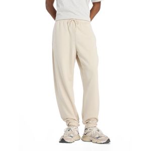 Pantalon New Balance Hombre French Terry Jogger Beige